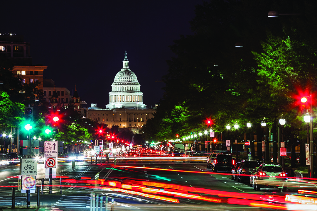 The Capitol Building lit up at night 