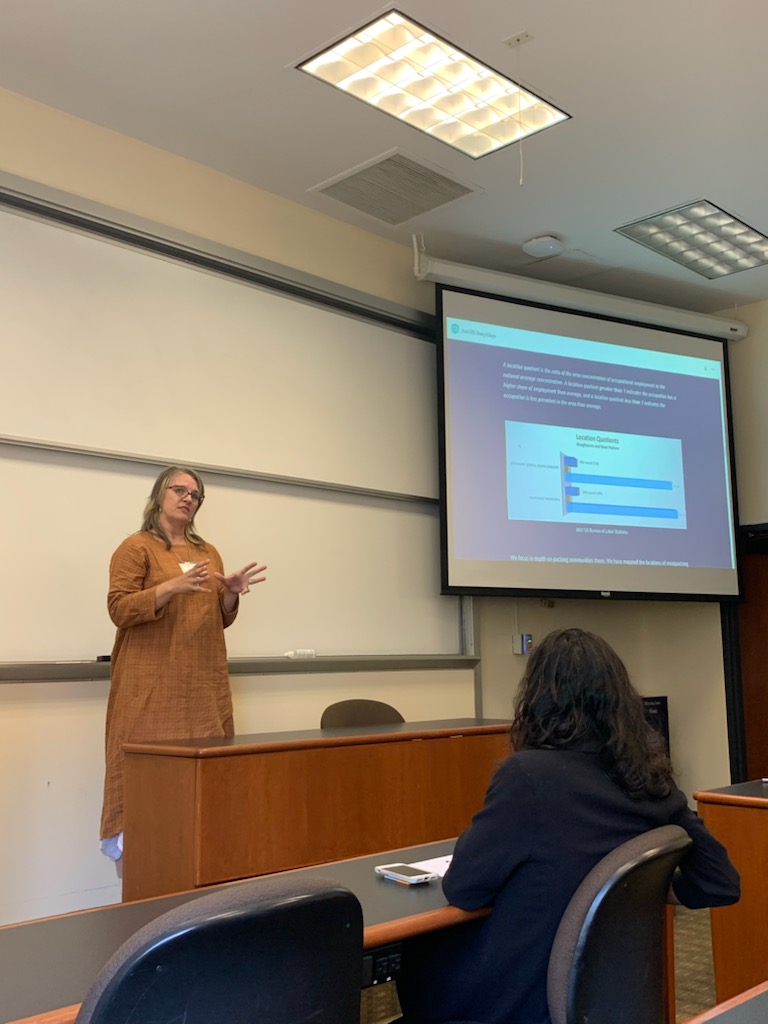 Ivy Ken presenting in a classroom.