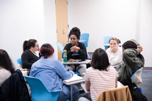 Students discussing in a circle in professor Hillary Silver's class