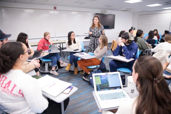 A group of students listening to their GTA in class